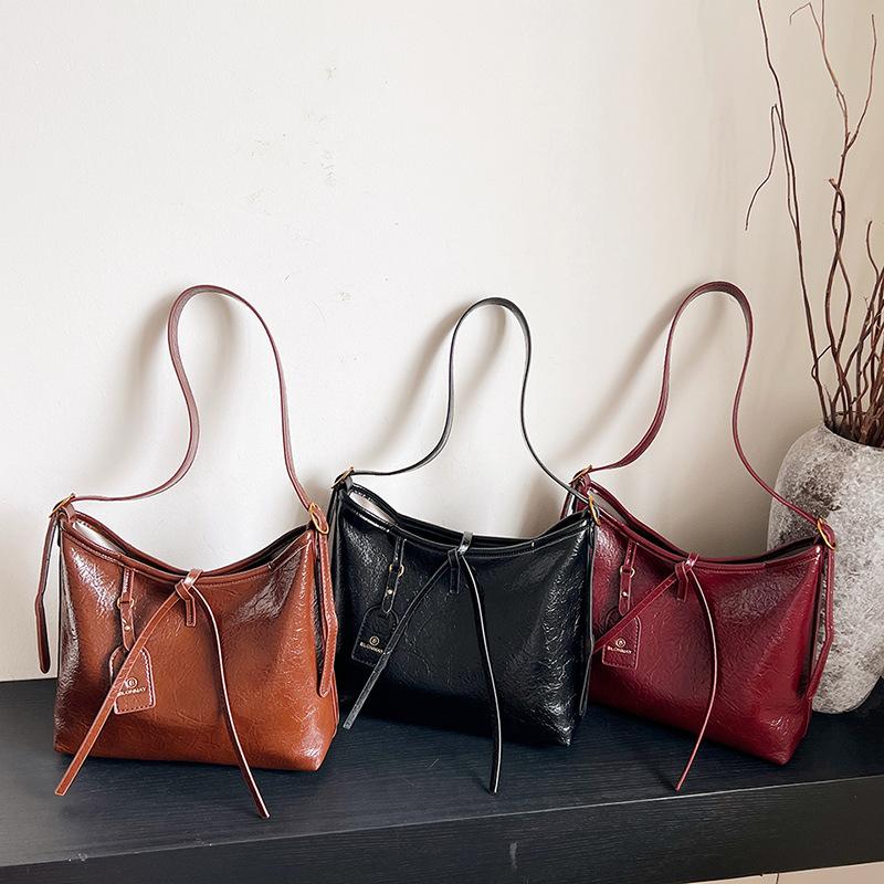 Einfache weiche Ledertextur Achseltasche Damen neue Retro-Stil Handtasche große Kapazität lässige Messenger-Schultertasche