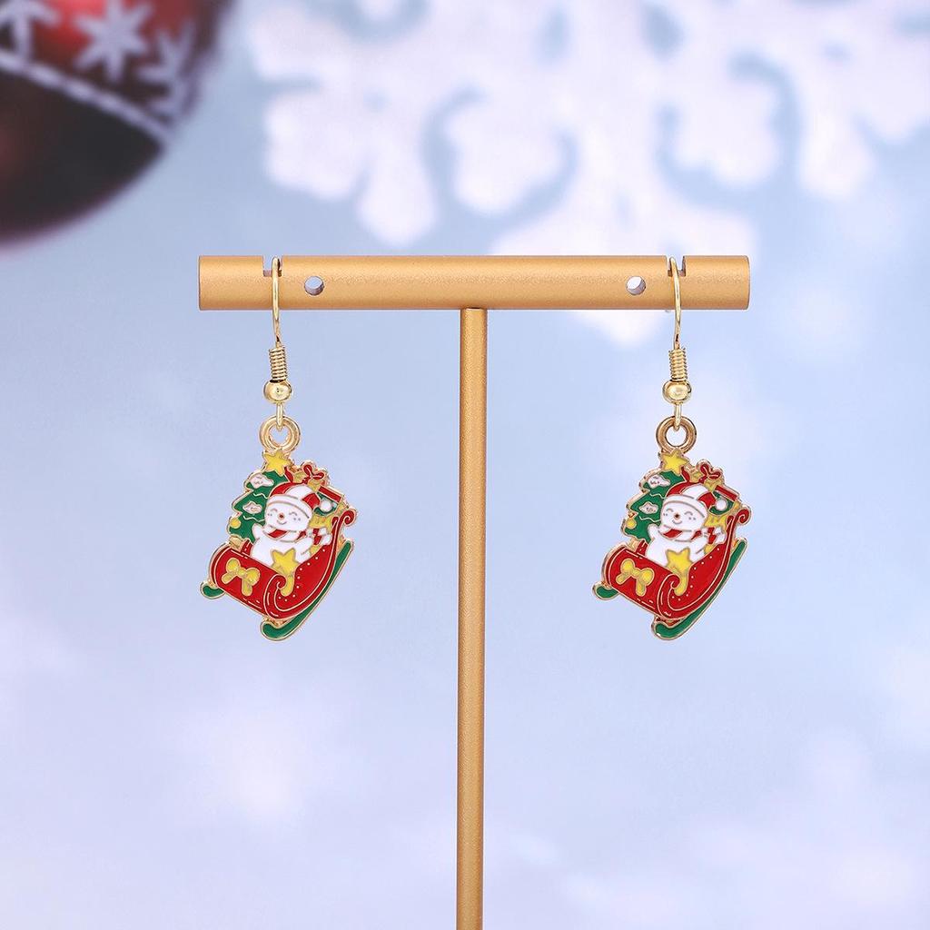 Festive Reindeer & Gingerbread Earrings: Christmas Cartoon Drip Oil Design