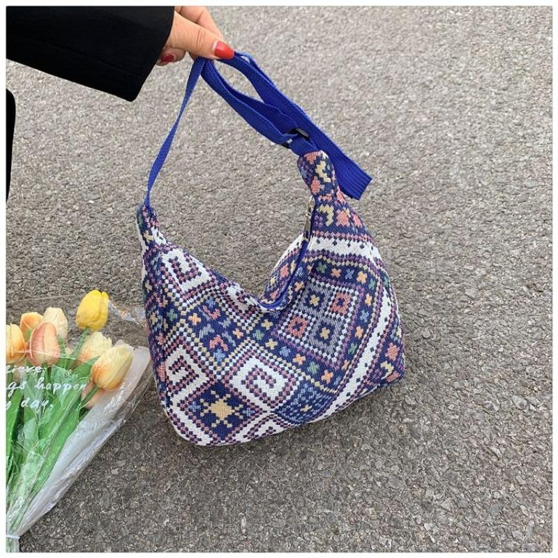 

Canvas large-capacity dumpling bag new spring and summer niche design shoulder messenger bag Width 27 Height 23 Bottom thickness 9cm фиолетовый