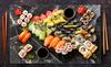 Szklana płyta ochronna na kuchenkę 80x52 Sushi