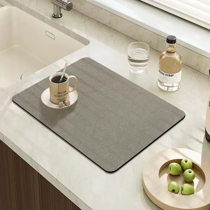

Кухонный впитывающий коврик Защитный коврик для столешницы Диатомовый грязепоглощающий быстросохнущий коврик Теплоизоляционный коврик Нескользящий коврик Коврик для мытья посуды 30*40CM