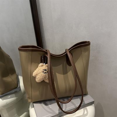 Sac à main texturé atmosphérique pour les déplacements quotidiens, nouveau printemps, sac polyvalent à bandoulière sous le bras, sac cabas tempérament