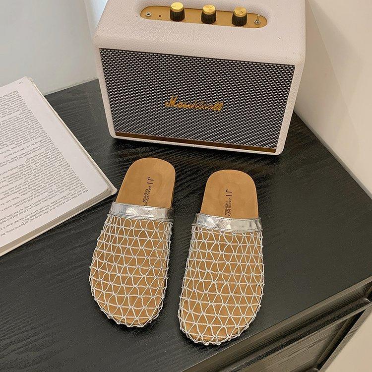 Niszowe tkane puste siateczkowe chłodne kapcie damskie buty do noszenia 2025 nowe letnie na płaskiej podeszwie oddychające sandały z zakrytą piętą