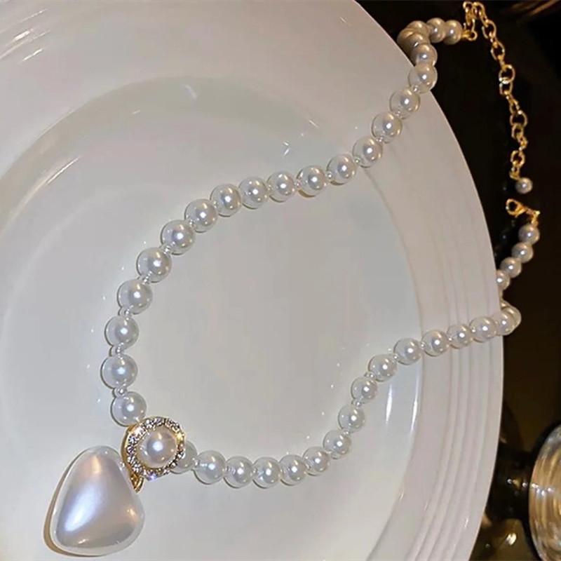 

Ожерелье «Любовь к жемчугу», инкрустированное бриллиантами, Женское нишевое ожерелье, Высококлассное ощущение с элегантными украшениями