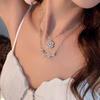 Fashionable women's four-leaf clover necklace with heart shape and full of diamonds; a versatile piece of jewelry that can be wo
