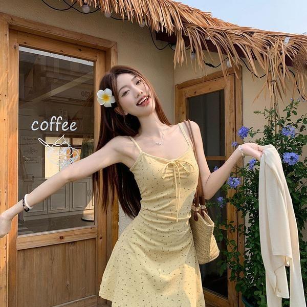 French yellow floral suspender dress women's summer 2026 fashion new waist A character looks thin and gentle Korean