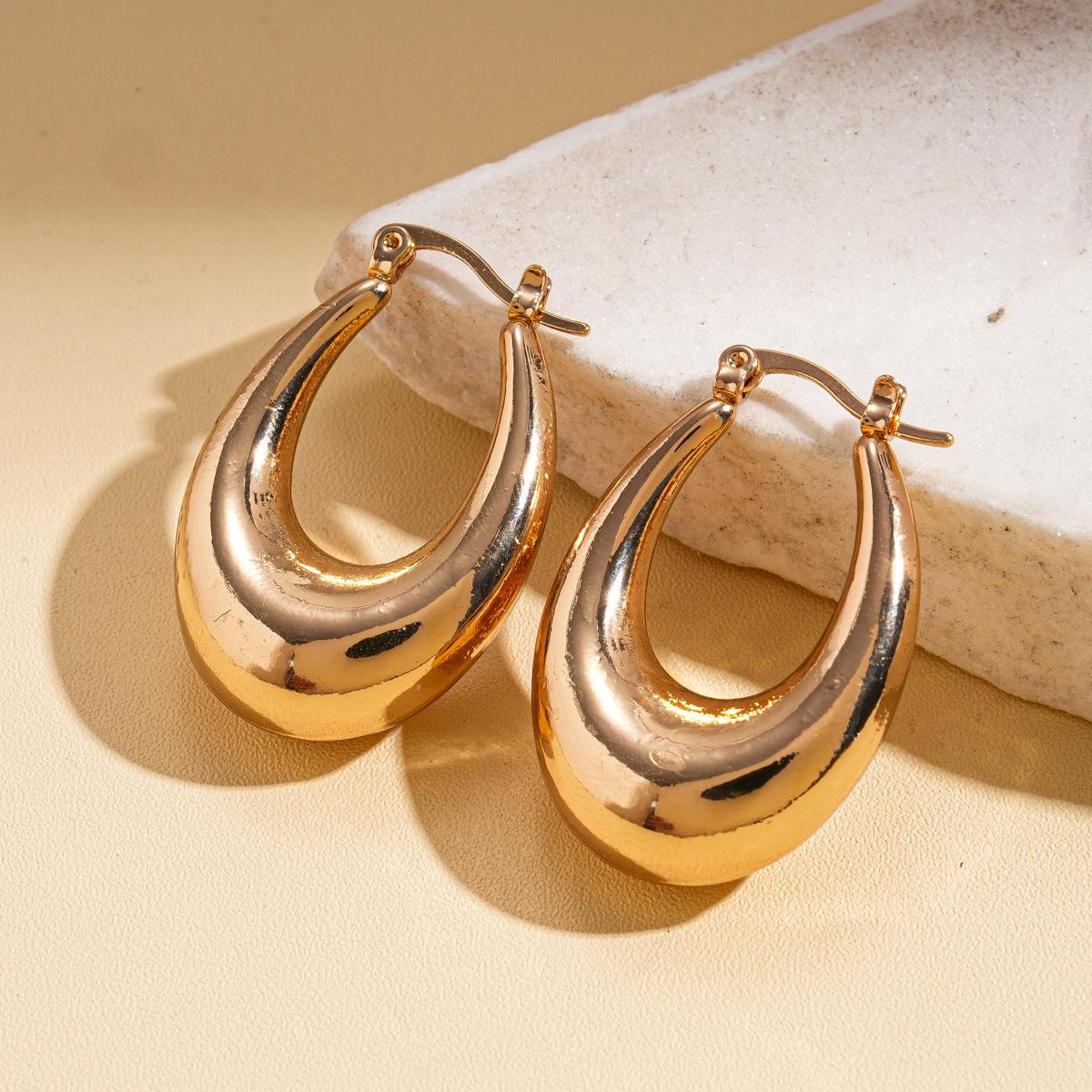 European and American metal sense hollow geometric U-shaped ear buckle simple cold wind personalized earrings niche earrings