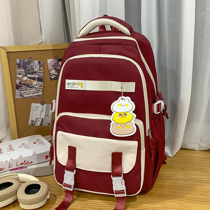 

Детские школьные ранцы Ученики начальной школы Девочки Ученики средней школы Большая вместимость Рюкзаки с высокой внешностью и вставками