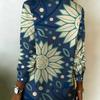 Sunflower-printed women's long-sleeved button-down shirt, featuring a fresh botanical pattern, creating a pleasant and casual look