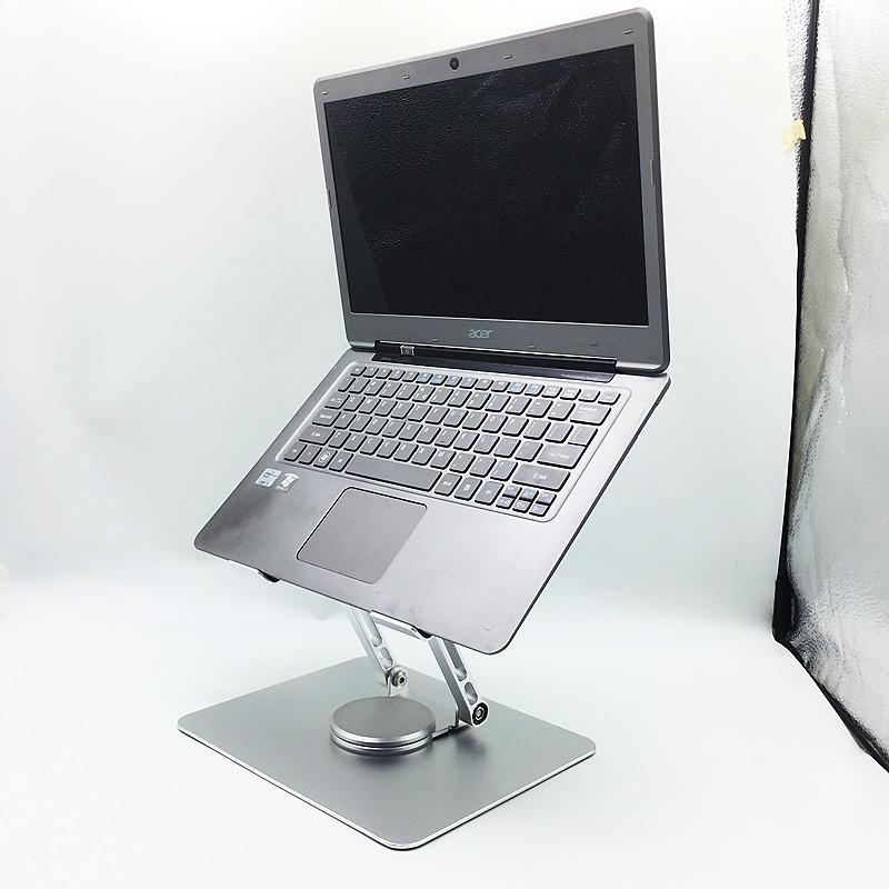 Adjustable Aluminum Alloy Laptop Stand with Cooling Riser and Rotating Feature