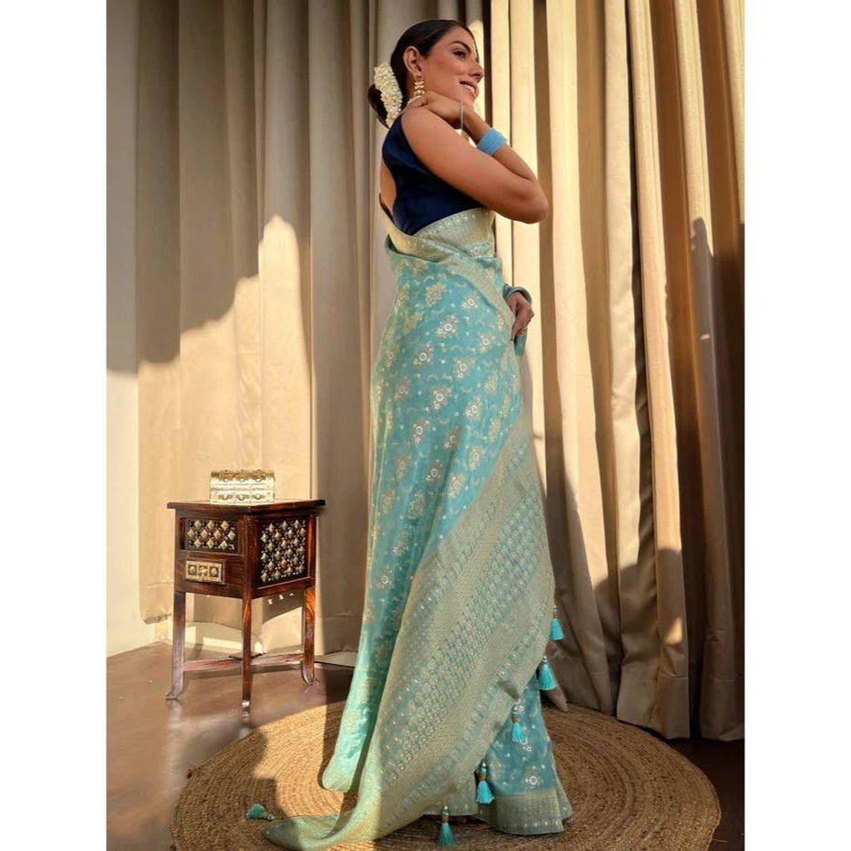 Silk Saree from the ALMAARI Store Is Adorned with Beautiful Zari Work In Form of Traditional Motifs.