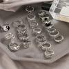 Pack of 24 Stylish Silver Gothic Rings for Men and Women Y2K Style Featuring Skull Cross Heart and Butterfly Elements
