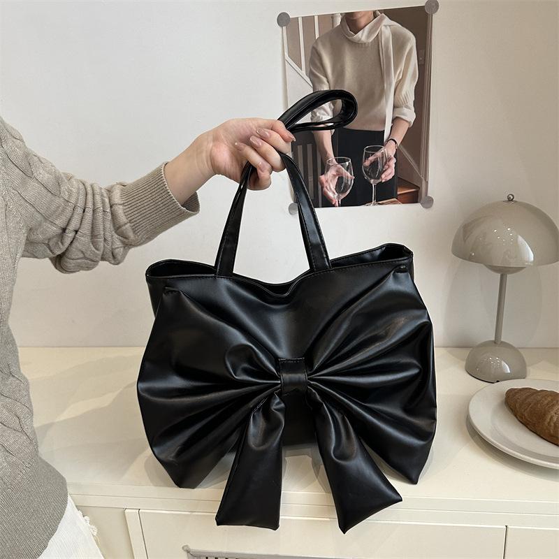 

Нишевый бант Новый однотонный Большая вместимость Повседневная осень 2025 Универсальная Повседневная Личность Модная сумка через плечо чёрный