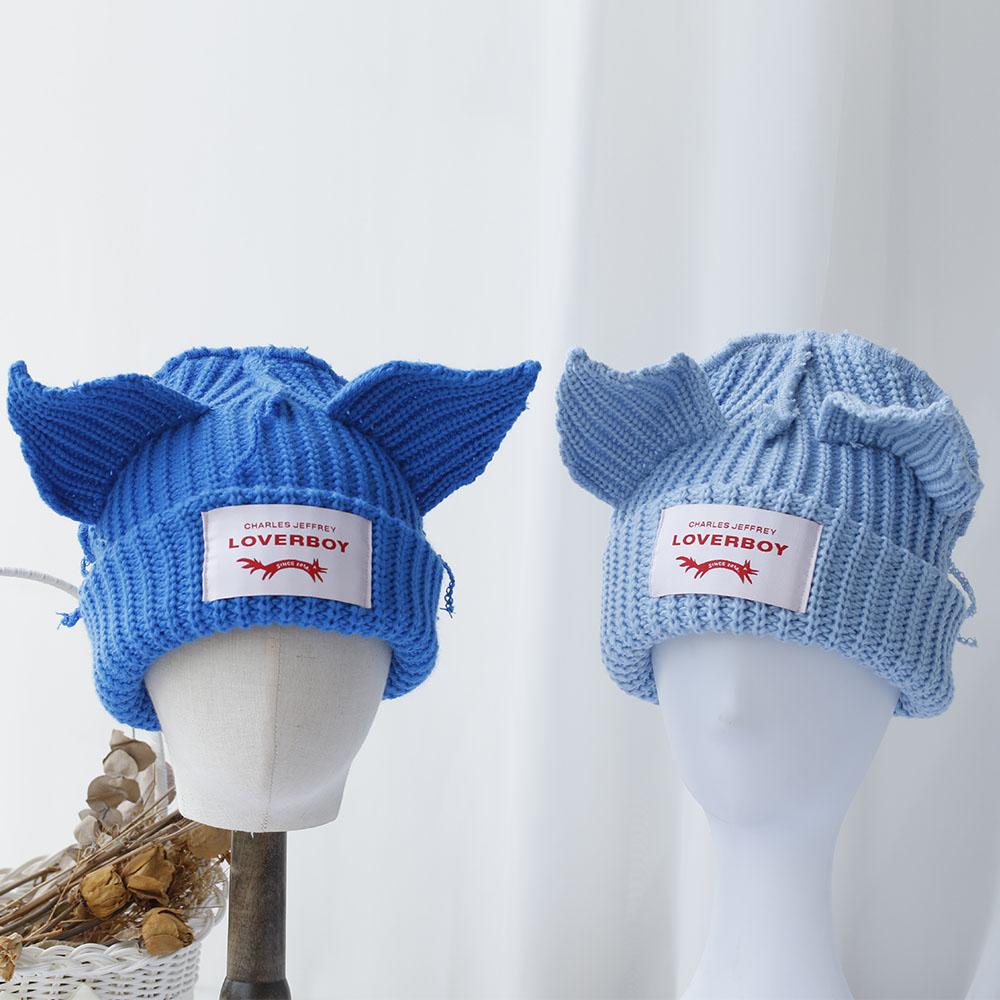 Bonnet tricot fait main Chapeau hiver en laine Vêtement pour femme
