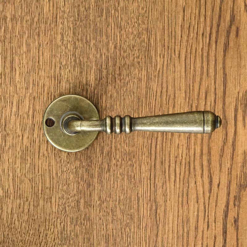 Manija de puerta DEVON con roseta ORO ANTIGUO