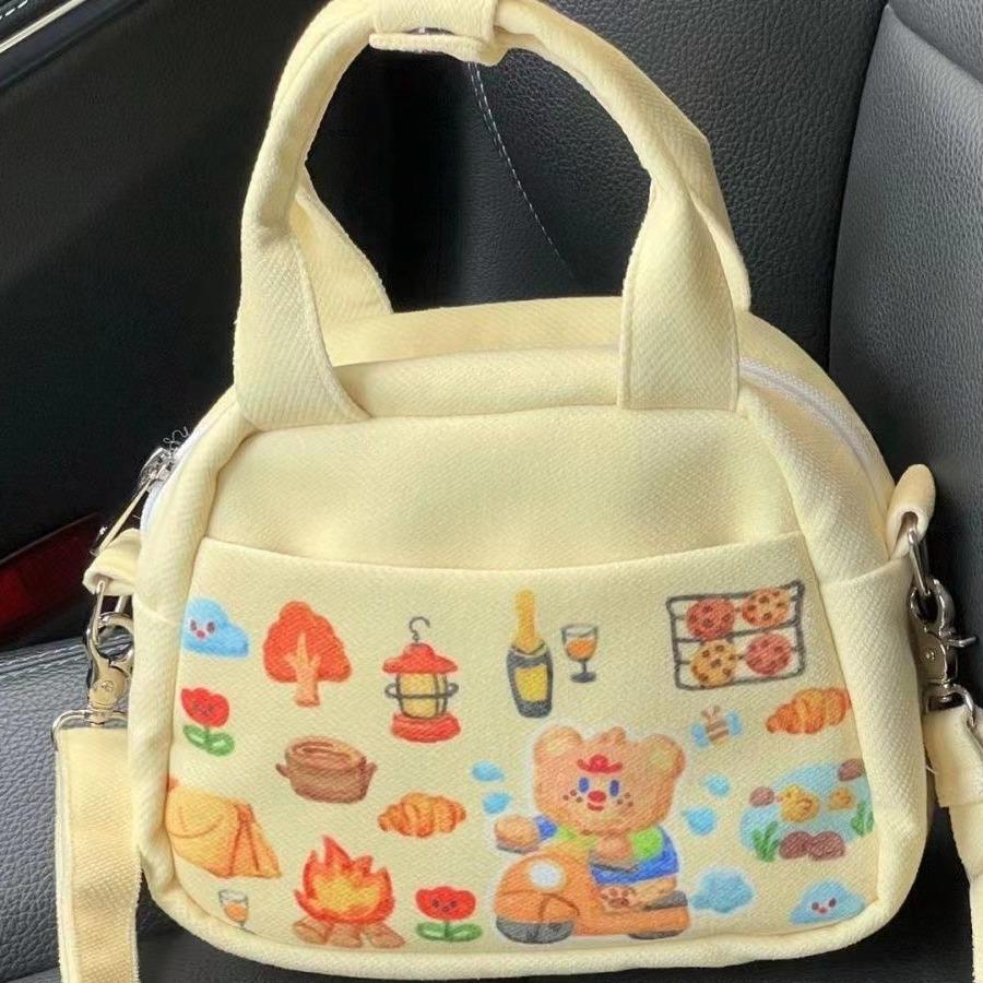 

New cartoon graffiti puppy shoulder bag lightweight canvas handbag student cute cartoon messenger bag female жёлтый