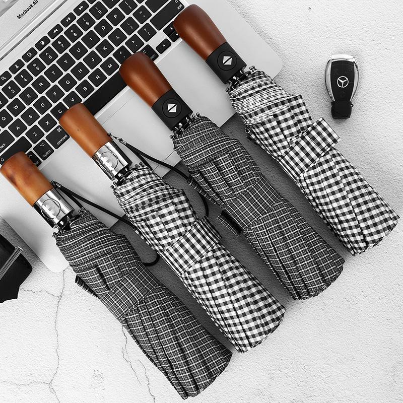 Ten-bone windproof umbrella three-fold automatic umbrella folding umbrella men's solid wood stripe plus umbrella