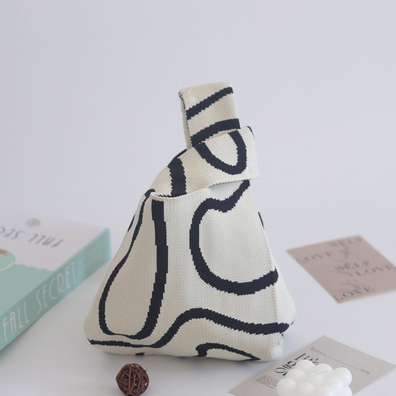 Ins Internet celebrity handbag women's knitted wool bucket bag Japanese and Korean version versatile hand carry casual tote bag box lunch bag
