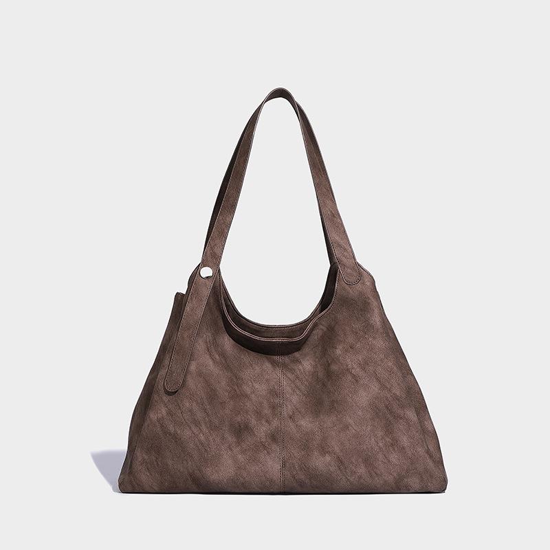 

Autumn and winter retro armpit bag 2024 new large-capacity tie-dye design portable tote bag commuter versatile shoulder bag темно-коричневого кольору