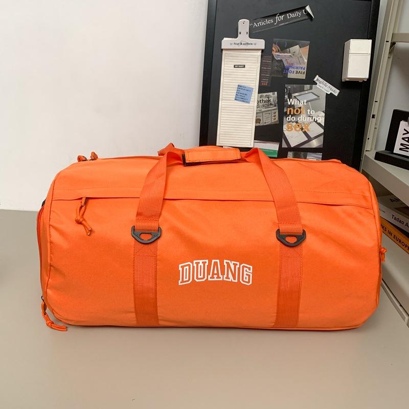Travel bag large capacity fitness super cool business trip luggage storage bag boarding shoulder bag aircraft special bag messenger bag оранжевый
