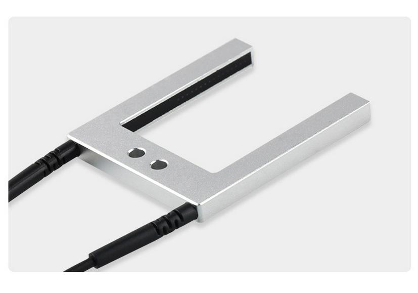 U-groove Through-beam Fiber Optic Sensor for Label Positioning with U-shaped Grating Probe