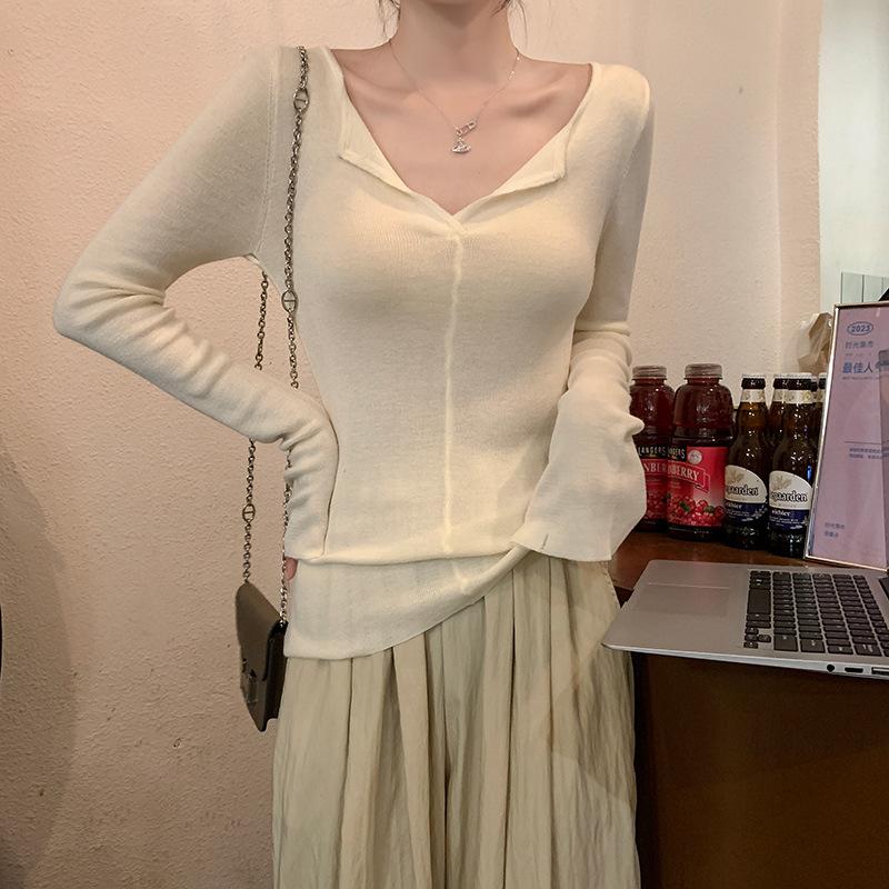 {Six wool} Pure desire V-neck solid color knitted sweater long-sleeved women's autumn and winter design sense Slim body and keep warm
