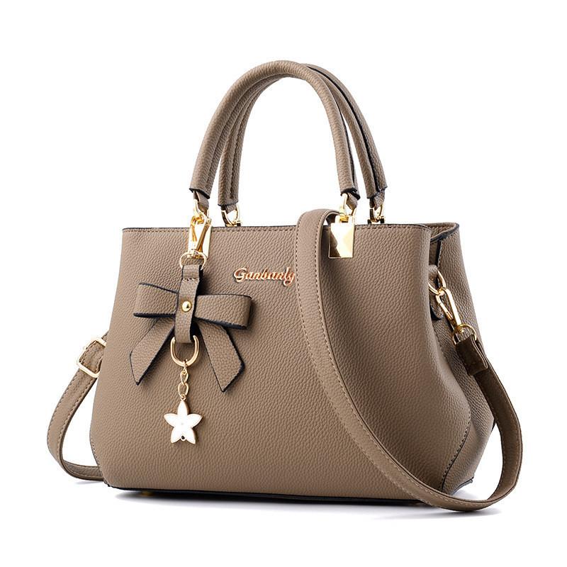 

Urban Minimalist Pu Shell Shape Handbag With Bow Knot Detail