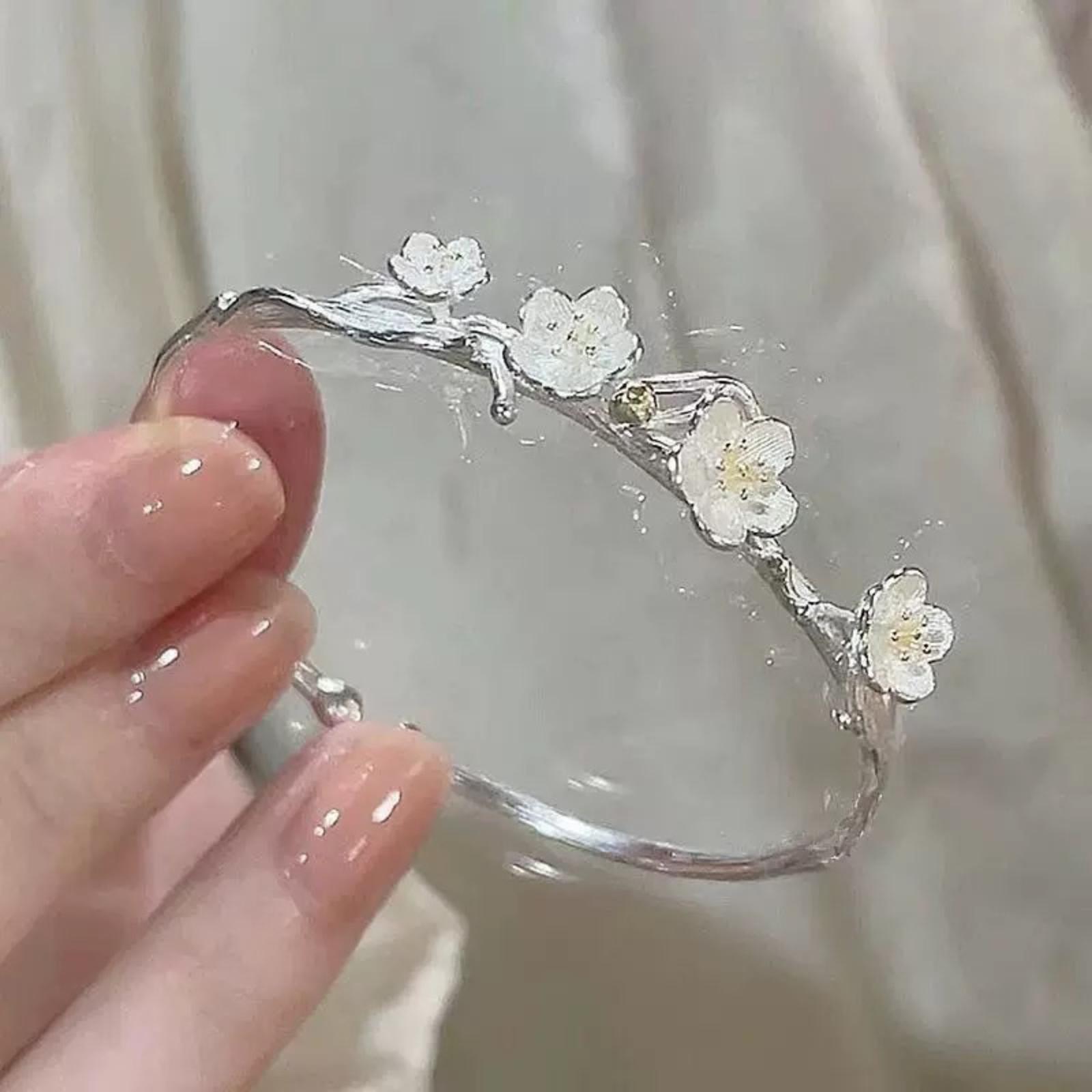 

Handcrafted Floral Design Bracelet for Women with Delicate Blossom Accents and Artistic Branch Motif Suitable for Daily Wear One Size белый