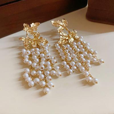 Europe and The United States Exaggerated Maple Leaf Pearl Tassel Earrings Personality Earrings for Women Temperament  Zircon