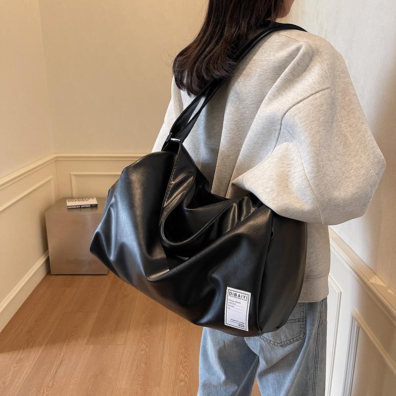 Damenstil Achsel-Reisetaschen für Reisen Französische Einfache Gepäcktaschen Trocken- und Nass-Trennung PU Kann für Ziehstange verwendet werden Fitnesstaschen