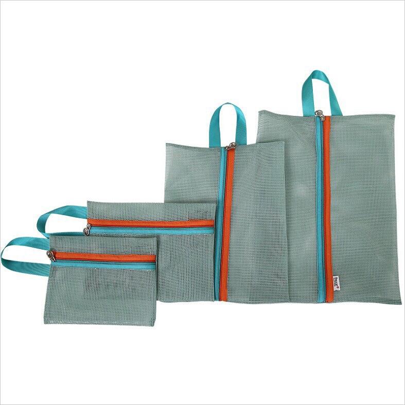 Travel Storage Bag Set: Four-Piece Mesh Clothes Organizer for Suitcases