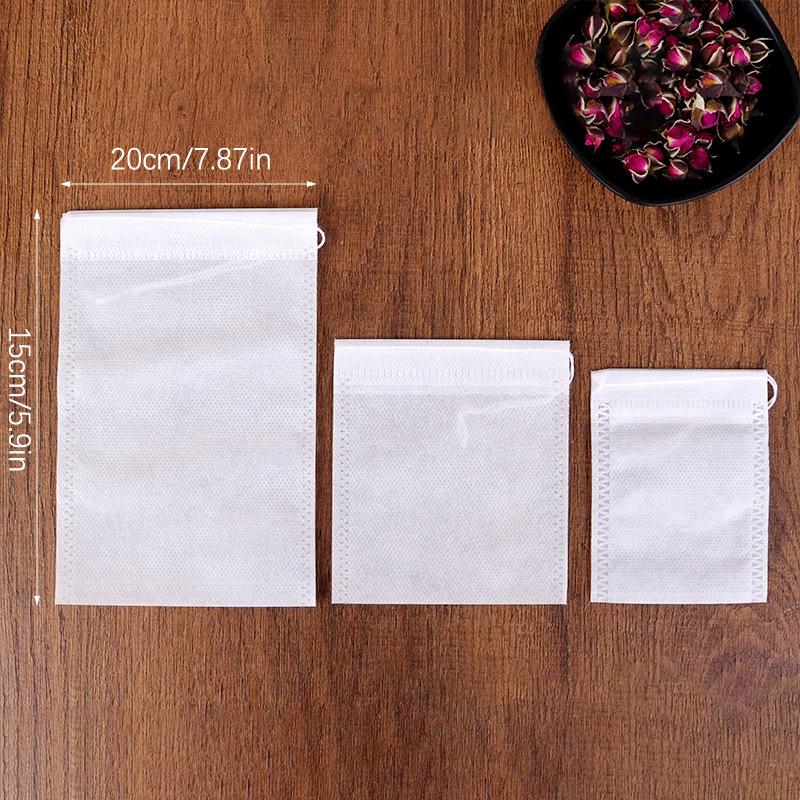 100Pcs Disposable Tea Bag Pouch Empty Non-Woven Fabric Drawstring Bag For Tea Infuser Spice Loose Coffee Seal Filter Mesh Bag