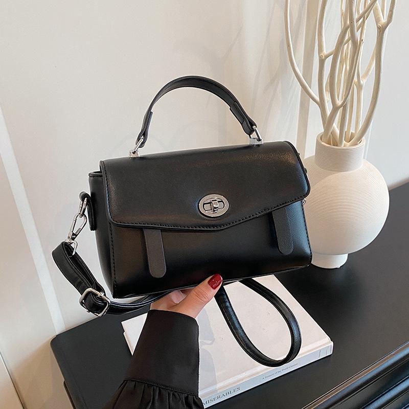 Summer new fashionable solid color lock flip bag versatile portable shoulder oblique span women's bag