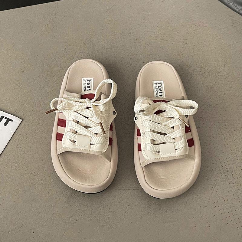 

Premium shit-stepping thick-soled slippers for women s summer wear 2025 new casual seaside beach one-word cool slippers 35