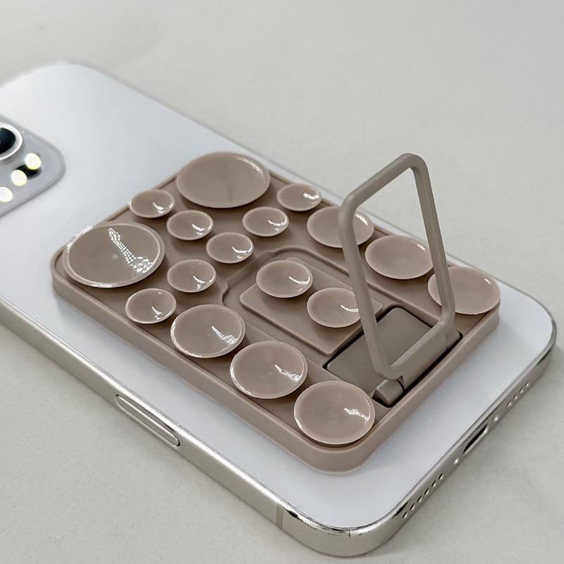 Multi-Functional Silicone Folding Suction Cup Phone Stand & Anti-Slip Back Sticker