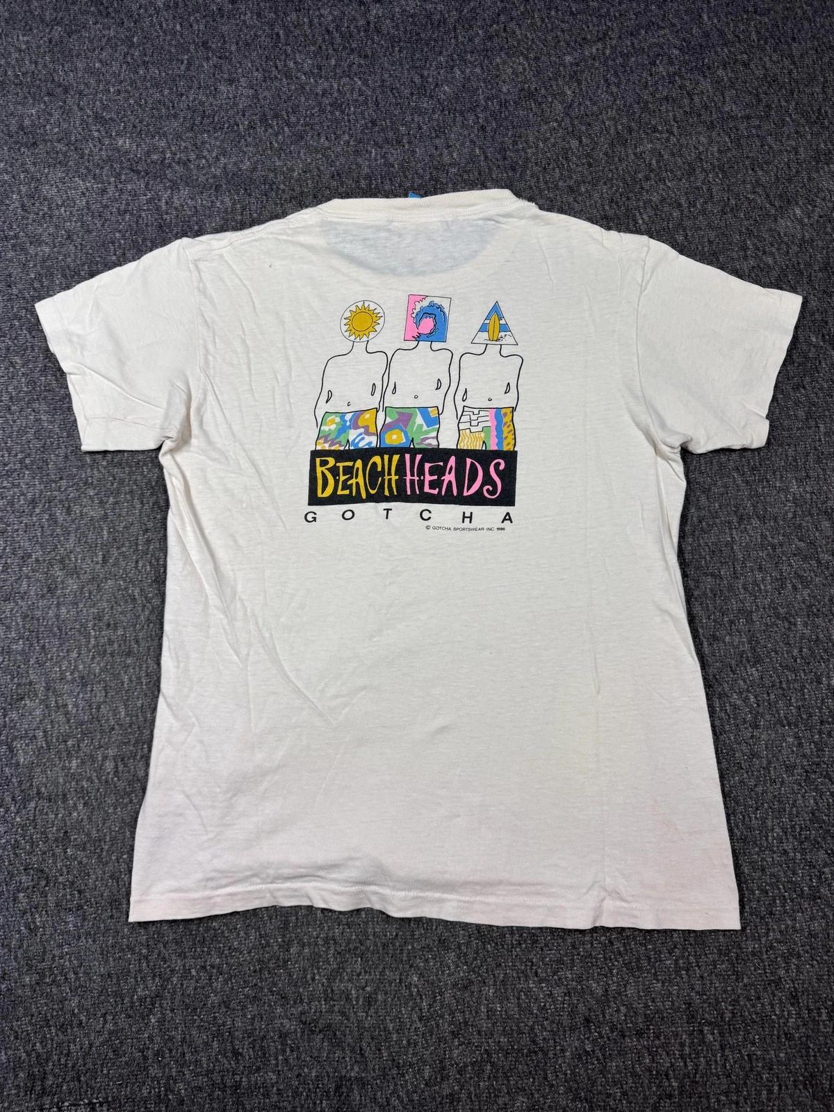 

Vintage Gotcha Beach Heads Shirt Mens XL White Graphic Surf Skate Tee 1986 80s 3XL