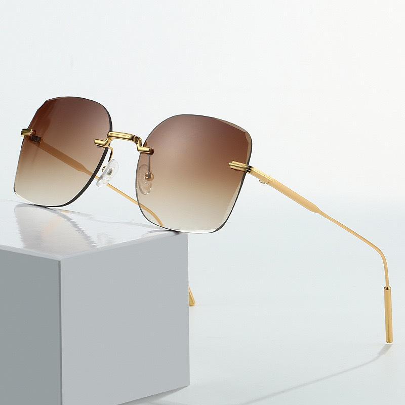2025 Unisex Rimless Metal Sunglasses with UV Protection & Gradient Lenses