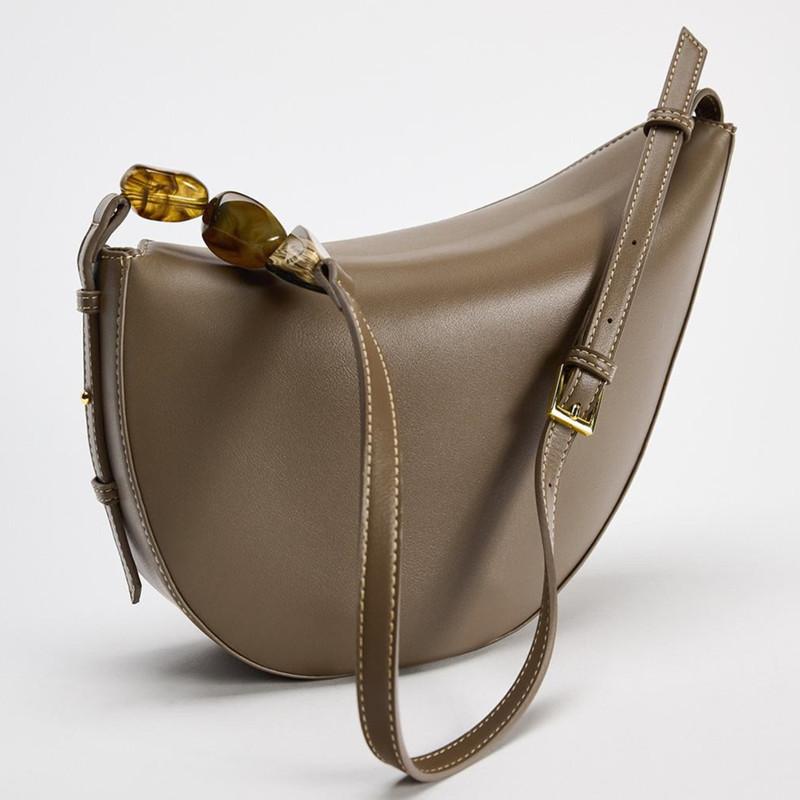 

2025 Fashion Classics Design Women Irregular Underarm Bag Casual PU Leather Handbags Asymmetric Shoulder Bag with Stone Chain