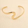 European & American Fashion Gold-Plated Wavy Bangle: Women's Alloy Armlet Jewelry