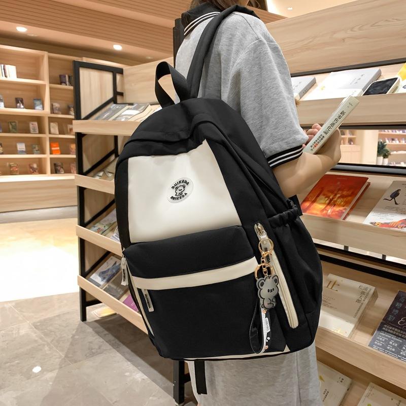 New schoolbag female high school student backpack junior high school student large capacity student third to sixth grade schoolbag