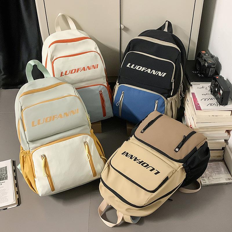 2025 new men's and women's backpacks, large-capacity multi-functional fashion backpacks, waterproof schoolbags for junior high school students, women