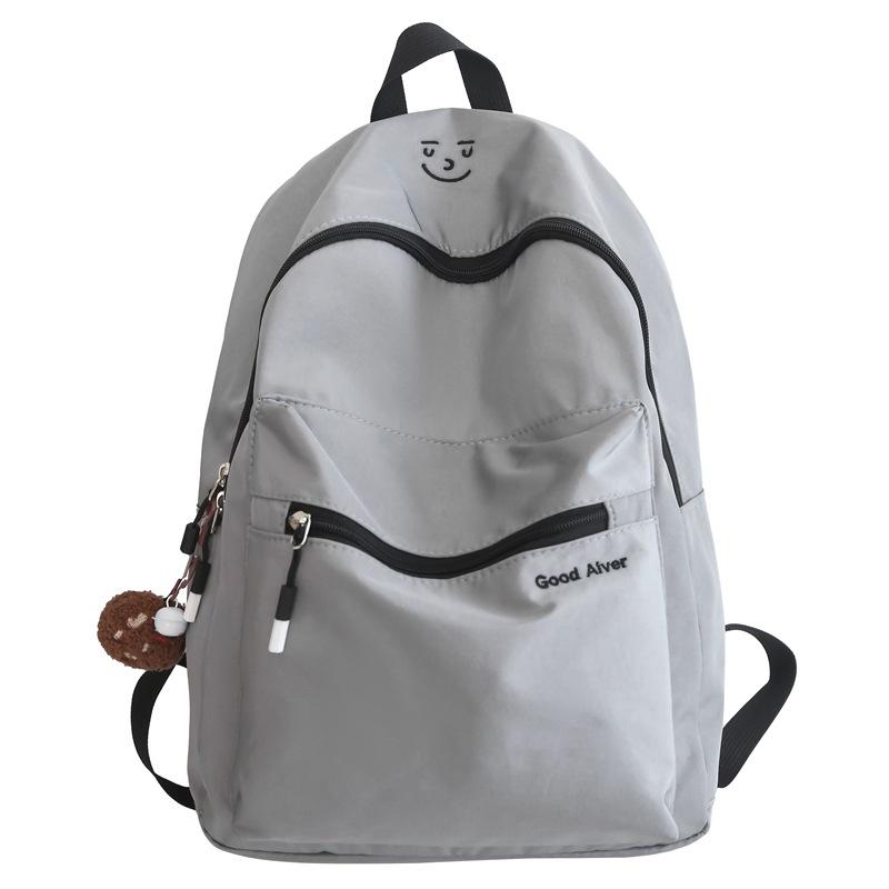 

Чоловічий дорожній рюкзак великої місткості. Жіночий шкільний ранець для молодших школярів сірий