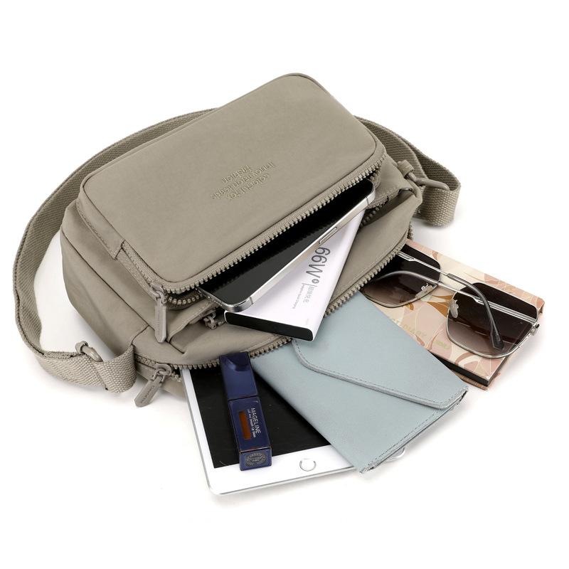 New Women's Versatile Multi-layer Nylon Leisure Commuter Travel Portable Messenger Bag