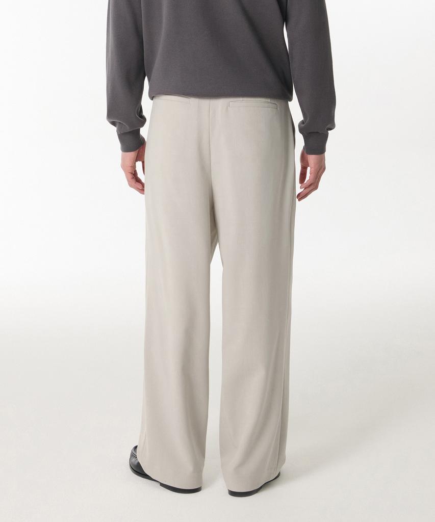 Musinsa Standard Deep Tuck Overlap Wide Hidden Banding Slacks [Dusty Cream]