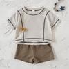 Korean Chic 2026 Summer Children's Waffle Knit Set: Short Sleeve T-shirt & Baby Shorts for Boys and Girls.