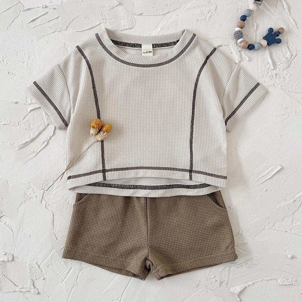 Korean Chic 2026 Summer Children's Waffle Knit Set: Short Sleeve T-shirt & Baby Shorts for Boys and Girls.