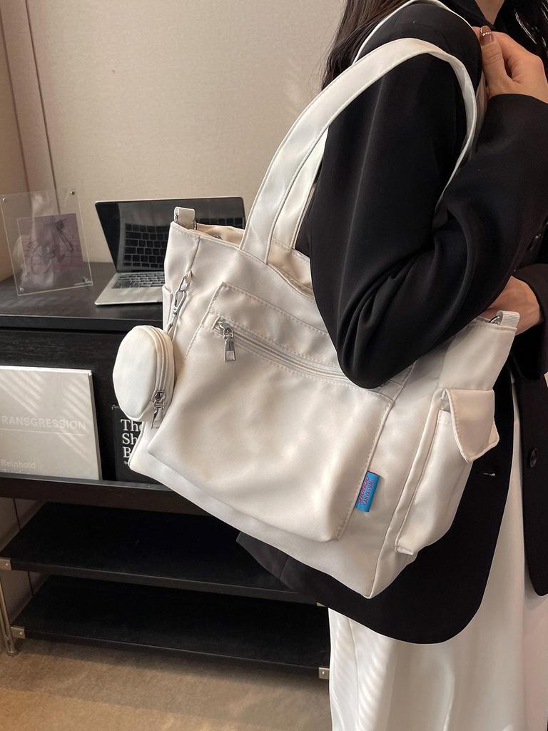 Japanese-Style Canvas Crossbody Bag: Double Pocket, Large Capacity, Women's Tote, Solid Color, Perfect for Students and Commuting.