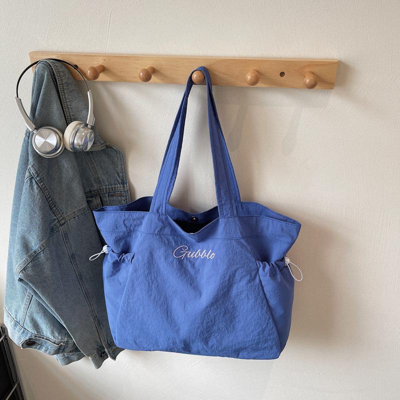 

Canvas bag women s large capacity summer versatile lazy wind shoulder bag leisure student class tote bag синий