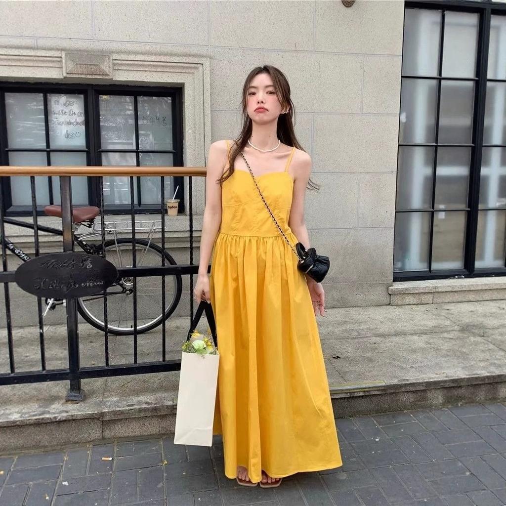 Dopamine yellow sleeveless suspender dress women's summer French feeling seaside vacation super fairy beach skirt women's clothing