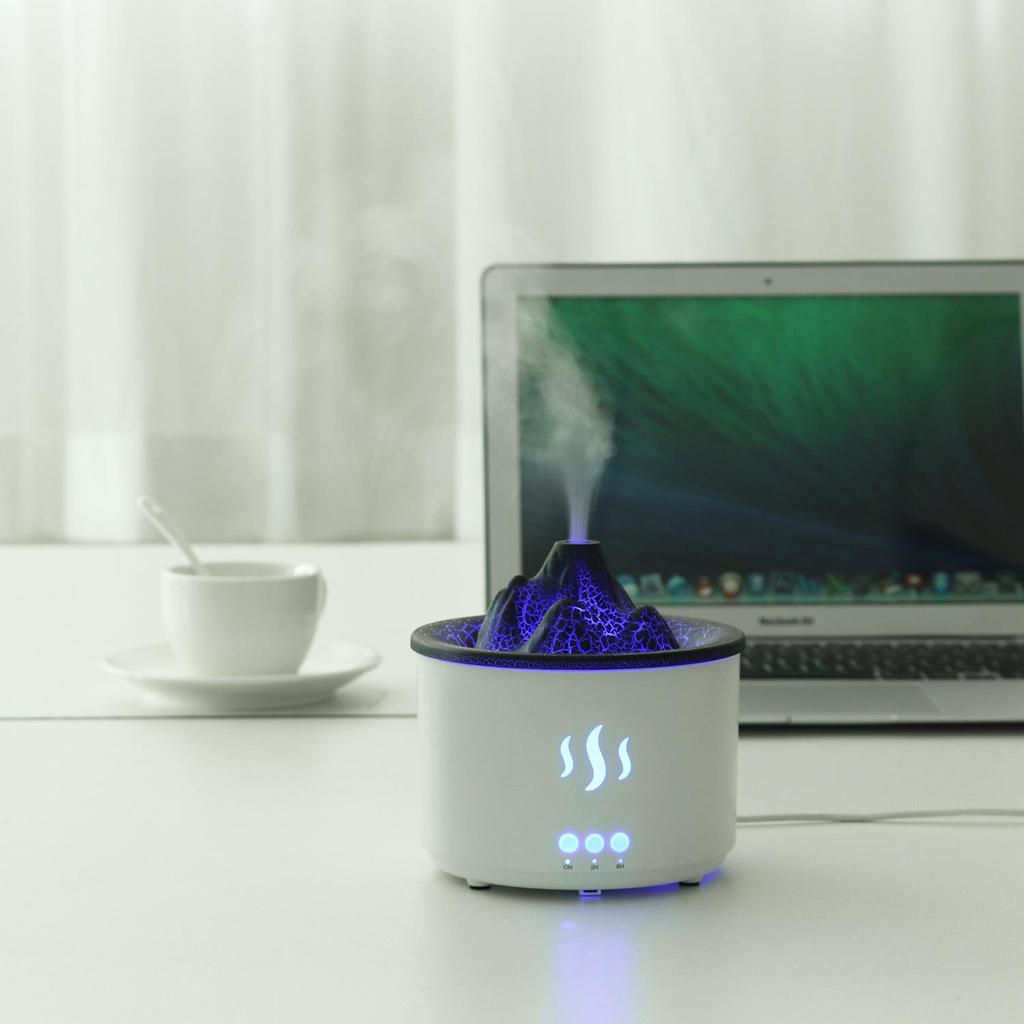 Compact Volcano Aromatherapy Humidifier: 400ml Desktop Water Oxygen Machine with Small Hollow Design and Crack Simulation.